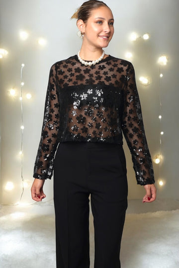 Haut noir transparent avec sequins en forme de fleurs